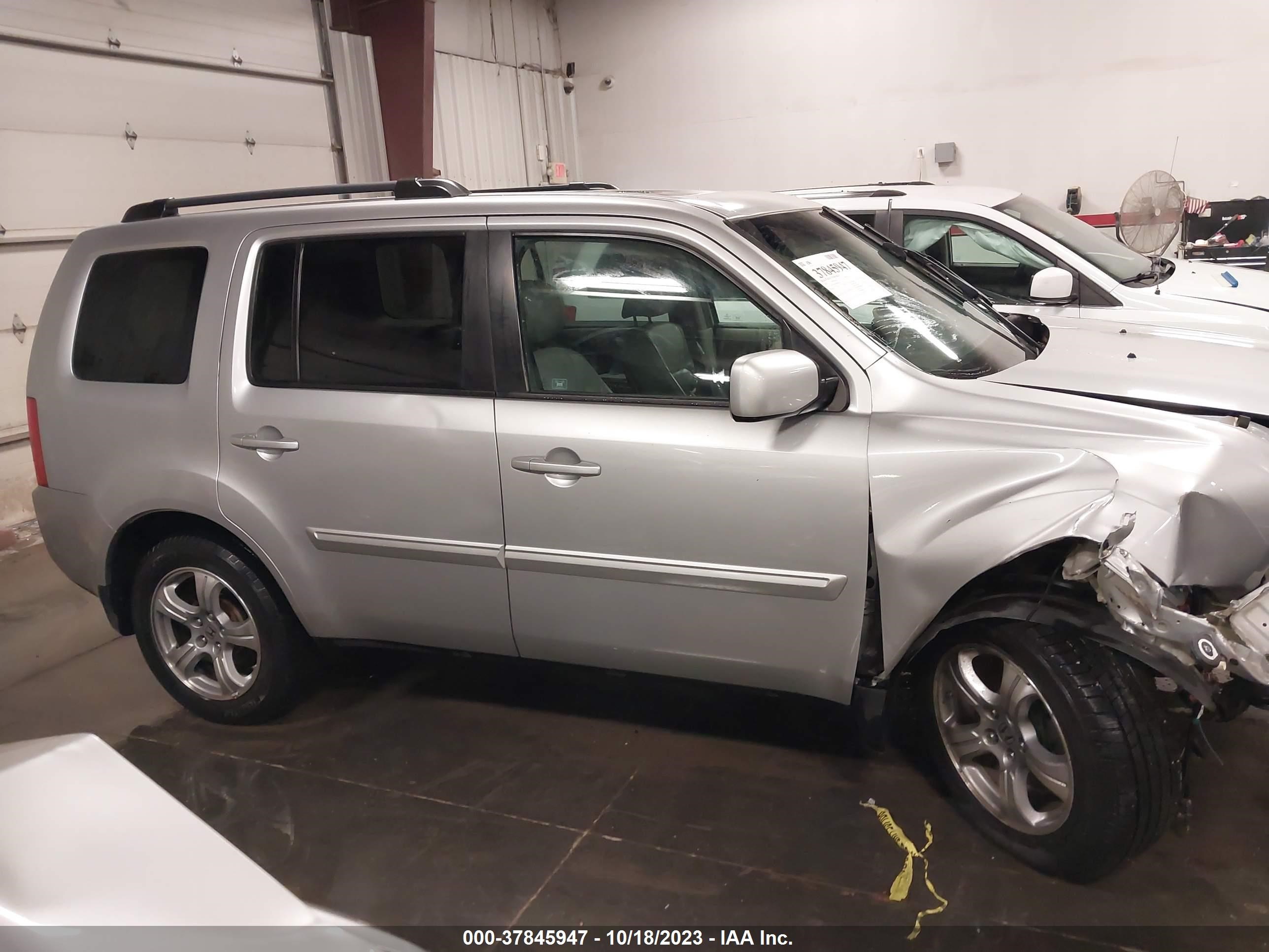 Photo 13 VIN: 5FNYF4H54CB065058 - HONDA PILOT 