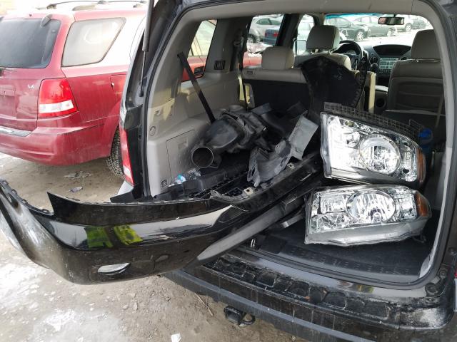 Photo 8 VIN: 5FNYF4H55BB055587 - HONDA PILOT EXL 