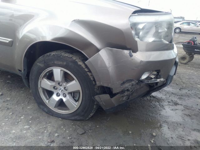 Photo 5 VIN: 5FNYF4H59BB047928 - HONDA PILOT 