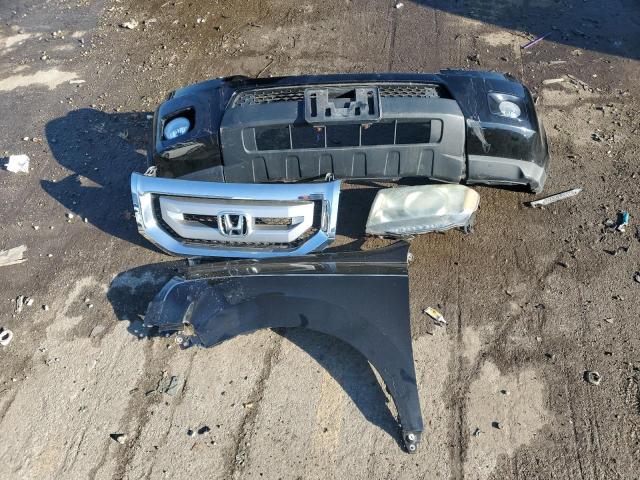 Photo 12 VIN: 5FNYF4H5XBB029468 - HONDA PILOT 