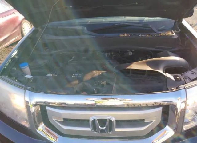 Photo 9 VIN: 5FNYF4H66BB011025 - HONDA PILOT 