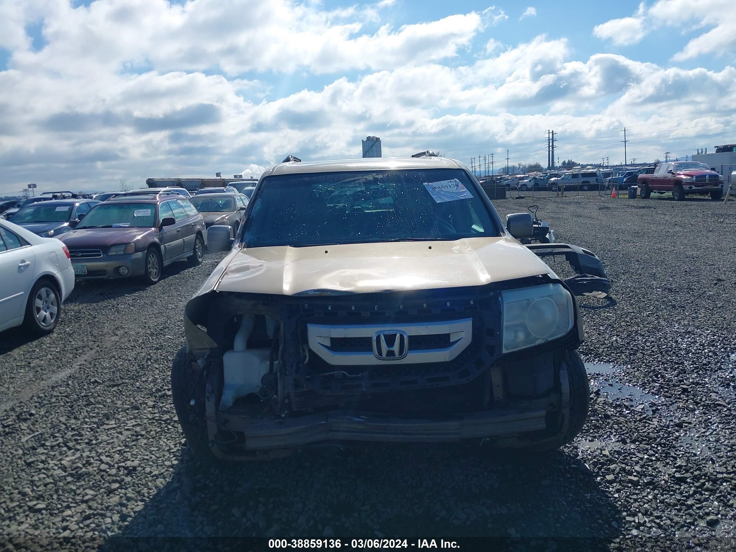 Photo 12 VIN: 5FNYF4H67BB022003 - HONDA PILOT 