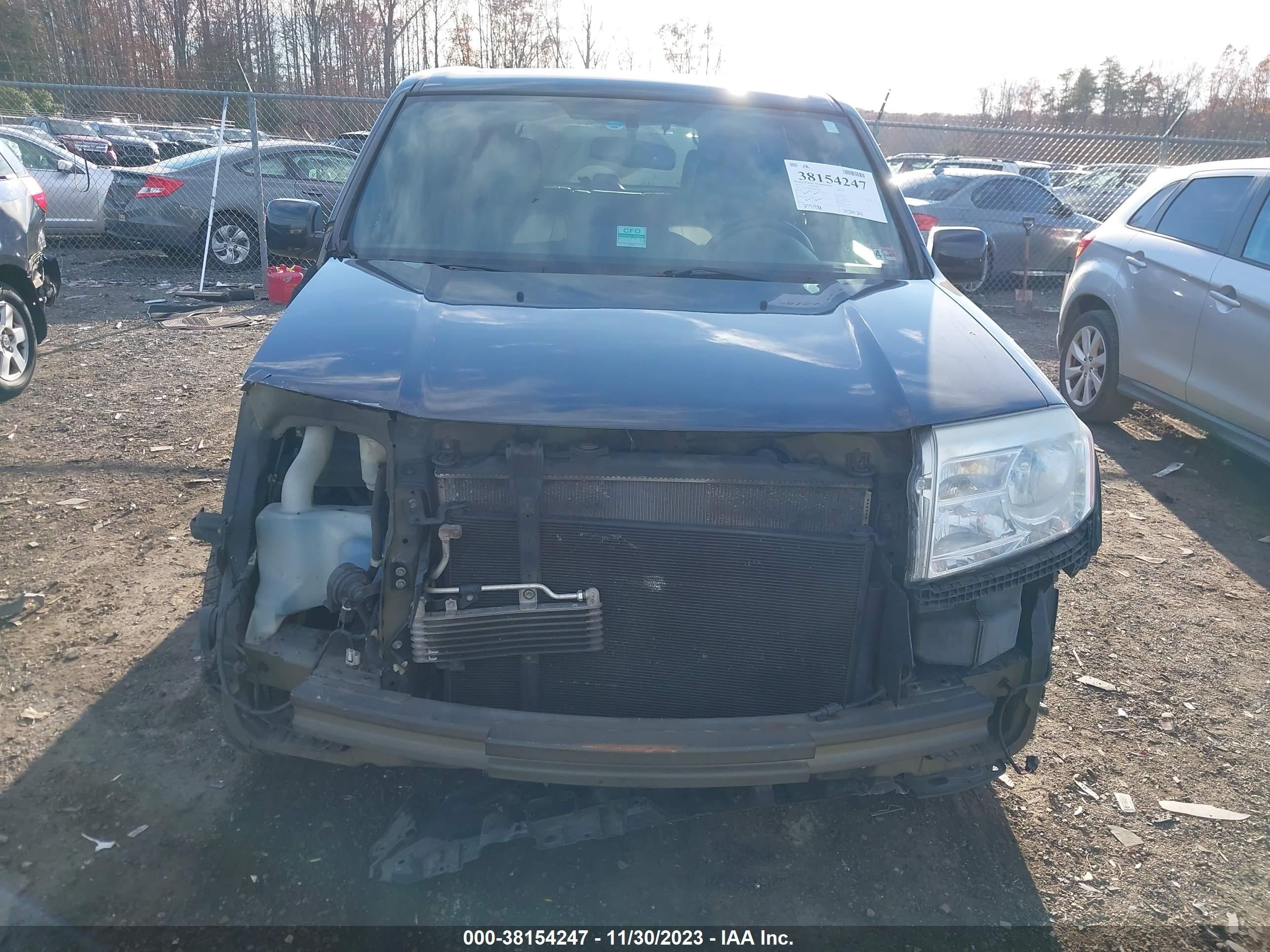 Photo 12 VIN: 5FNYF4H72DB061464 - HONDA PILOT 