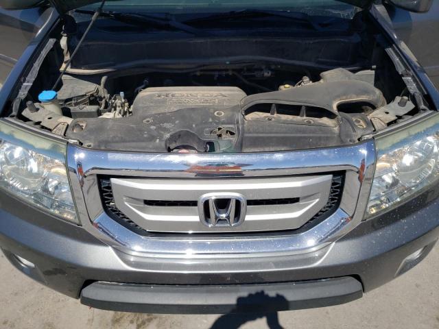 Photo 11 VIN: 5FNYF4H79BB003980 - HONDA PILOT 