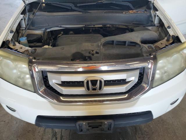 Photo 11 VIN: 5FNYF4H79BB007463 - HONDA PILOT 