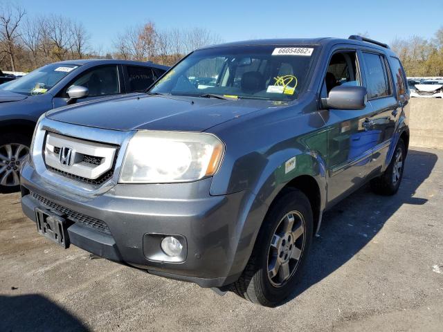 Photo 1 VIN: 5FNYF4H82AB011281 - HONDA PILOT TOUR 