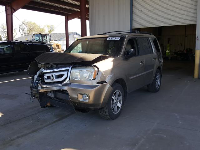 Photo 1 VIN: 5FNYF4H84AB004364 - HONDA PILOT TOUR 