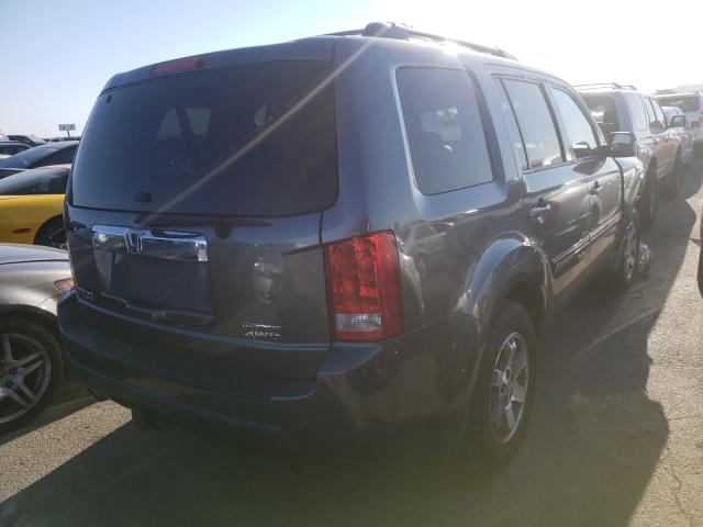 Photo 3 VIN: 5FNYF4H90AB021901 - HONDA PILOT TOUR 