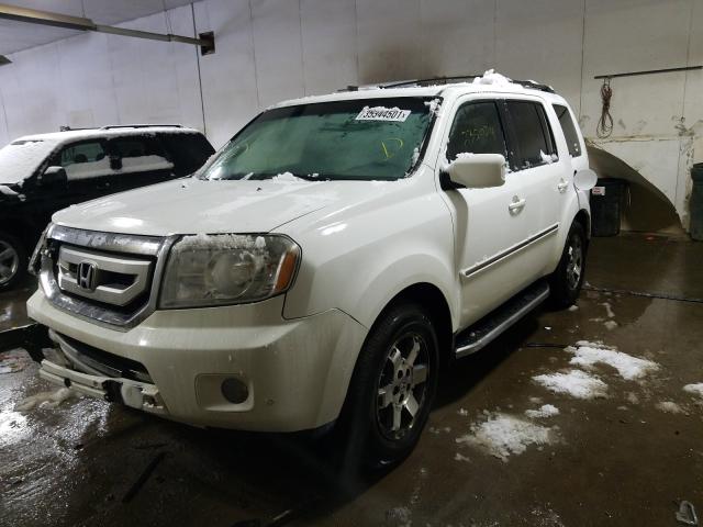 Photo 1 VIN: 5FNYF4H91AB035581 - HONDA PILOT TOUR 