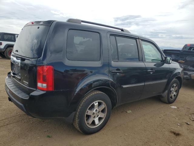 Photo 2 VIN: 5FNYF4H92AB005571 - HONDA PILOT TOUR 