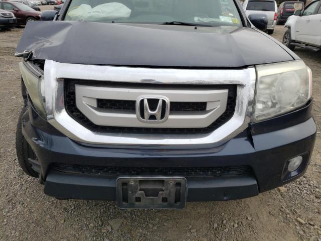 Photo 11 VIN: 5FNYF4H92BB041004 - HONDA PILOT TOUR 