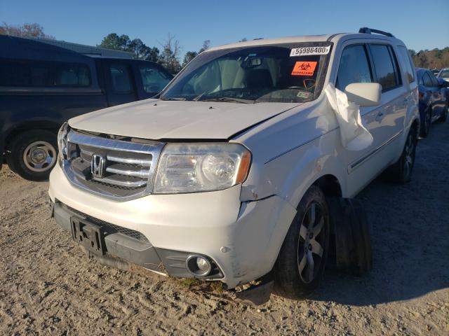 Photo 1 VIN: 5FNYF4H92CB055437 - HONDA PILOT TOUR 