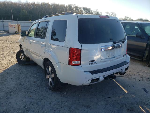 Photo 2 VIN: 5FNYF4H92CB055437 - HONDA PILOT TOUR 