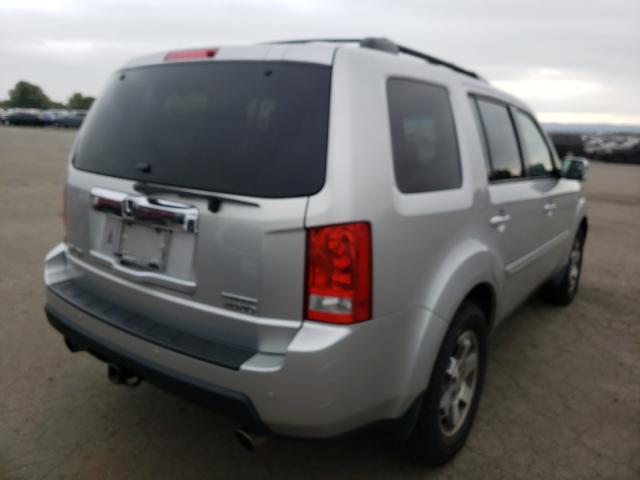 Photo 3 VIN: 5FNYF4H94AB002820 - HONDA PILOT TOUR 