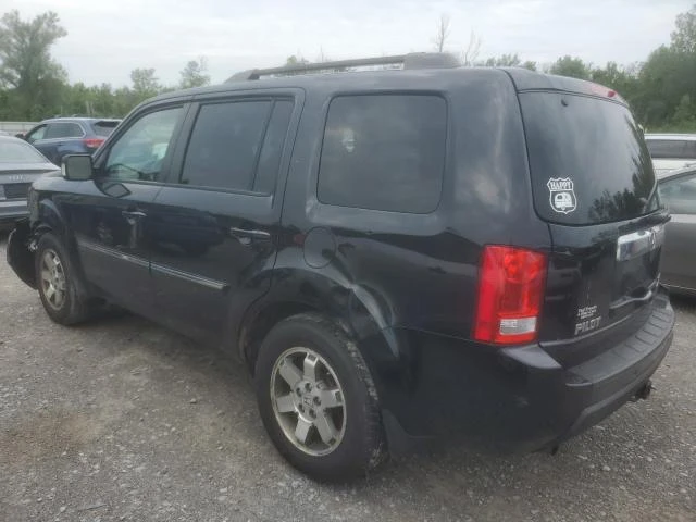 Photo 1 VIN: 5FNYF4H94AB020590 - HONDA PILOT TOUR 