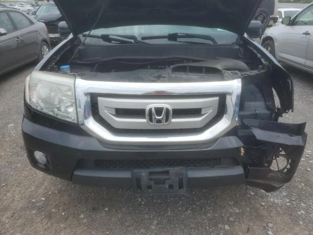 Photo 11 VIN: 5FNYF4H94AB020590 - HONDA PILOT TOUR 