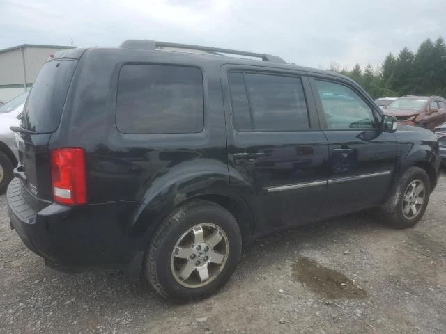 Photo 2 VIN: 5FNYF4H94AB020590 - HONDA PILOT TOUR 