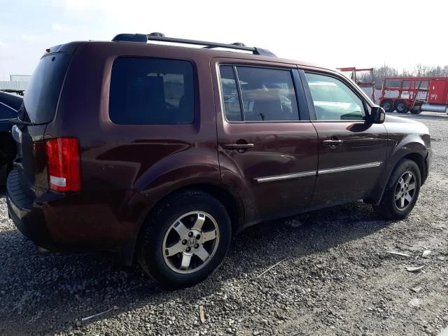 Photo 2 VIN: 5FNYF4H94BB060587 - HONDA PILOT TOUR 