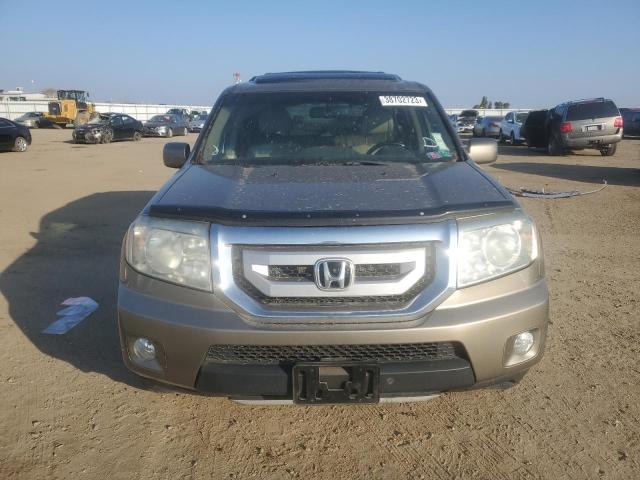 Photo 4 VIN: 5FNYF4H94BB072013 - HONDA PILOT TOUR 