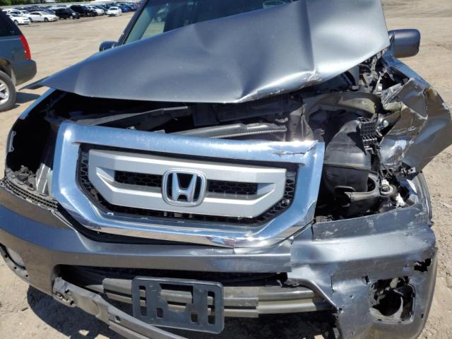 Photo 11 VIN: 5FNYF4H94BB081102 - HONDA PILOT 