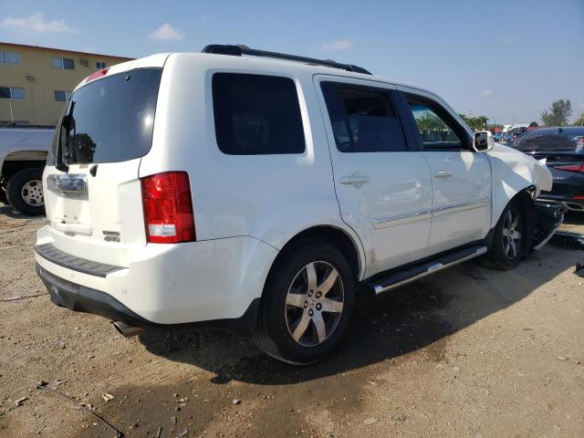 Photo 2 VIN: 5FNYF4H94CB063233 - HONDA PILOT TOUR 