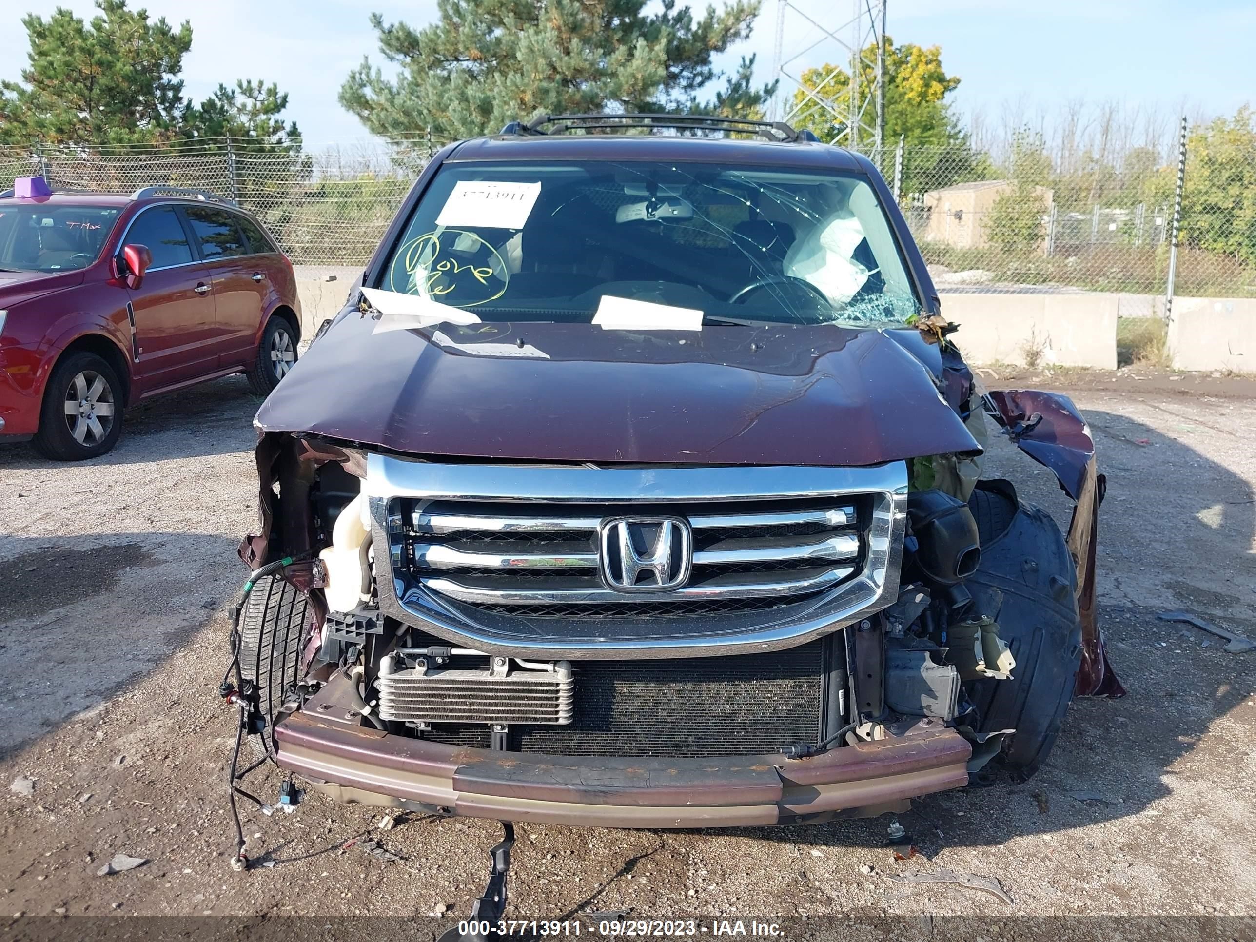 Photo 11 VIN: 5FNYF4H94EB054454 - HONDA PILOT 