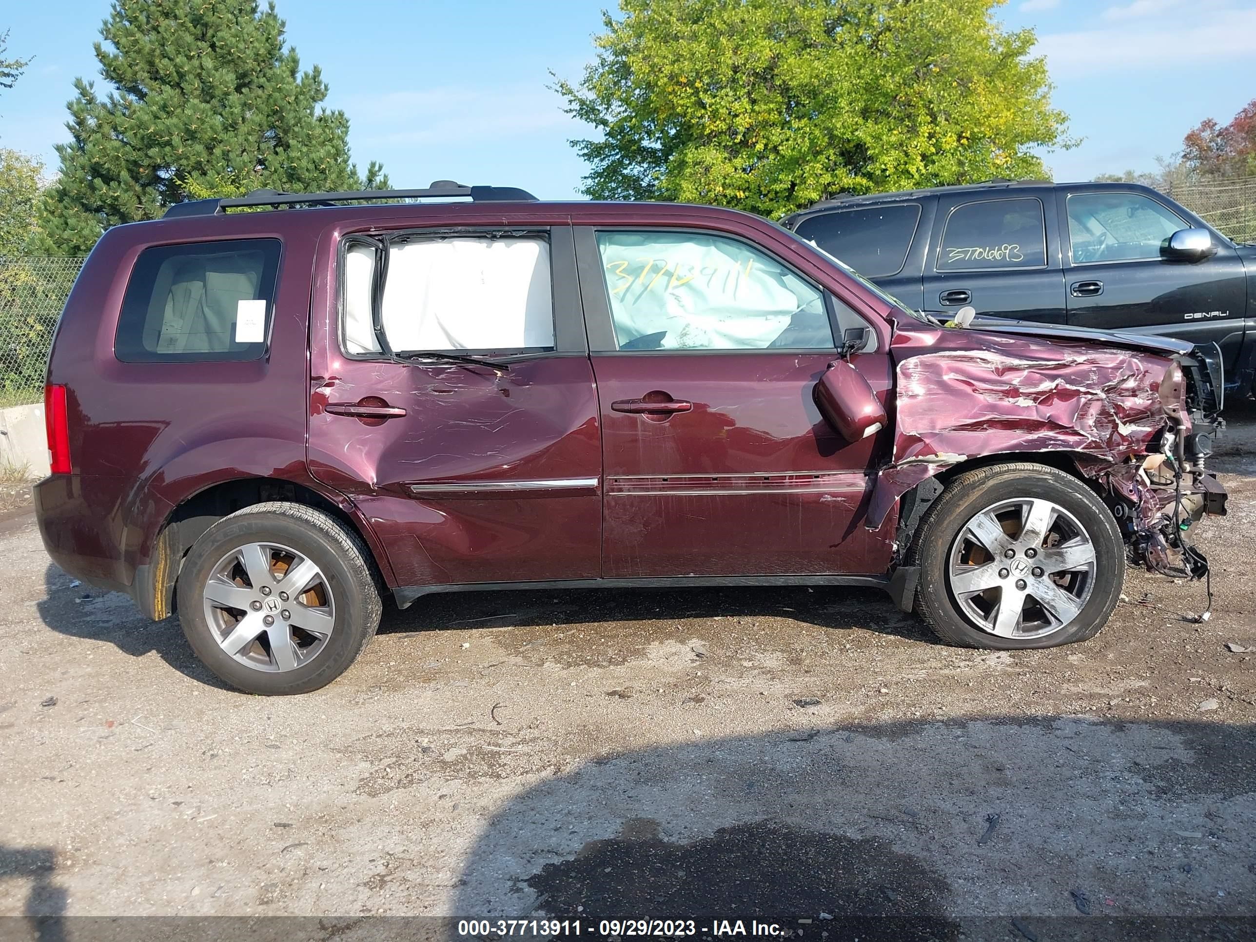 Photo 12 VIN: 5FNYF4H94EB054454 - HONDA PILOT 