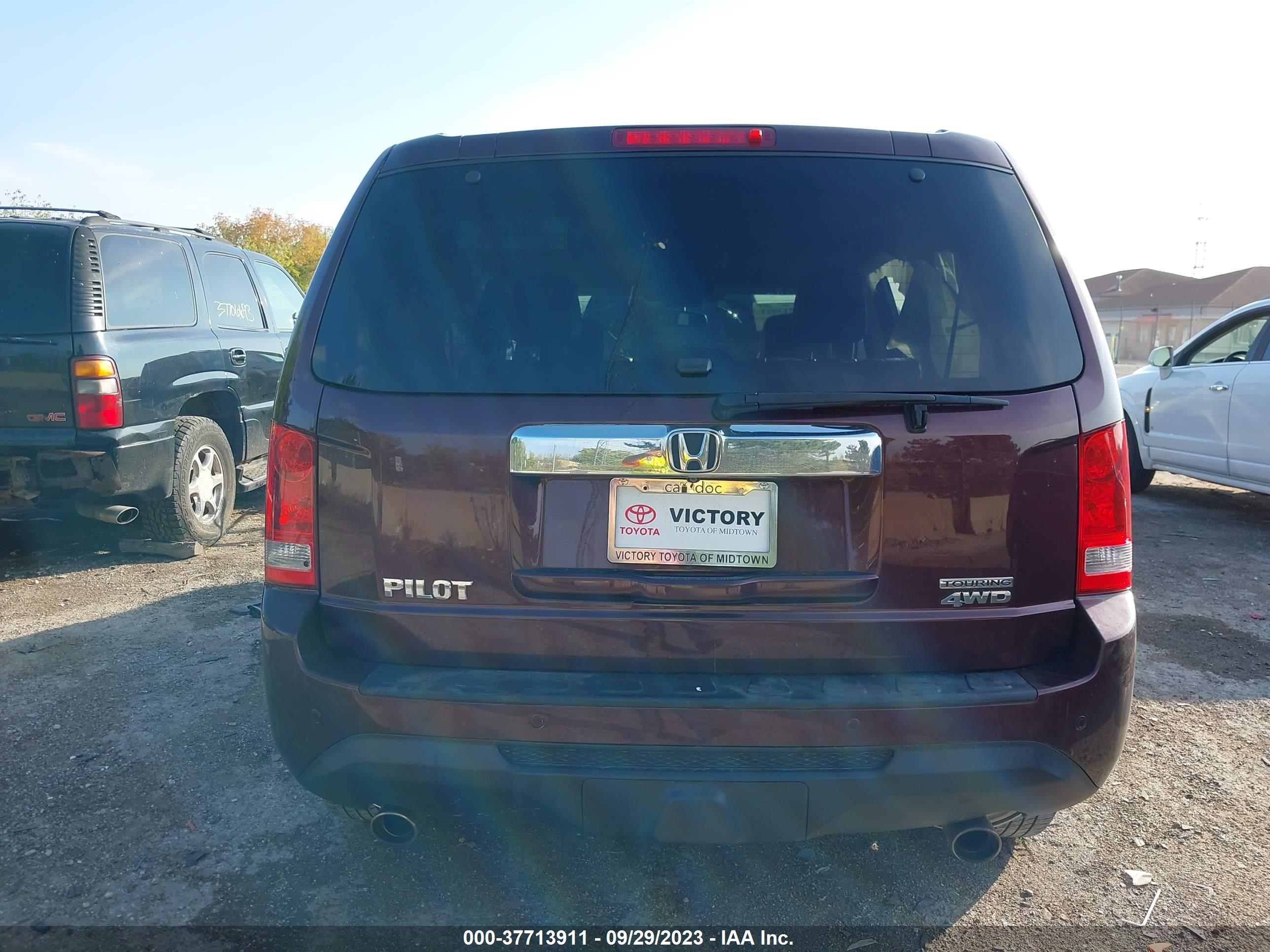 Photo 15 VIN: 5FNYF4H94EB054454 - HONDA PILOT 