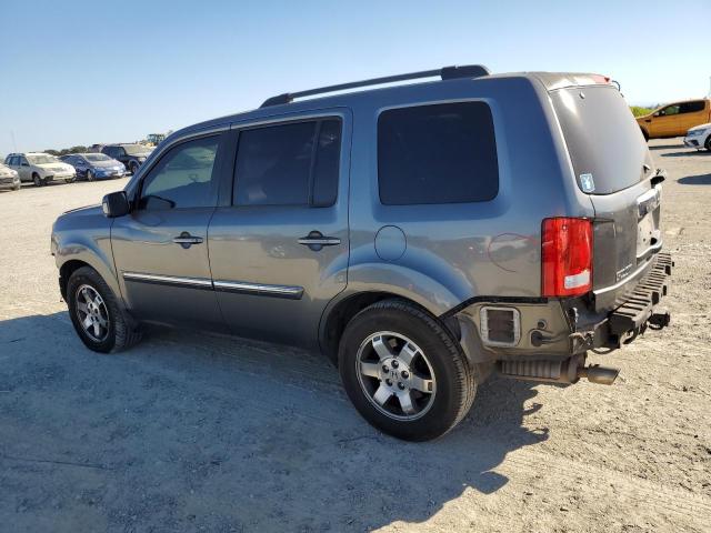 Photo 1 VIN: 5FNYF4H95AB037723 - HONDA PILOT TOUR 