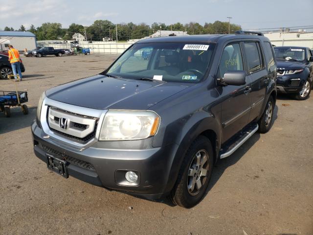 Photo 1 VIN: 5FNYF4H95BB038288 - HONDA PILOT TOUR 