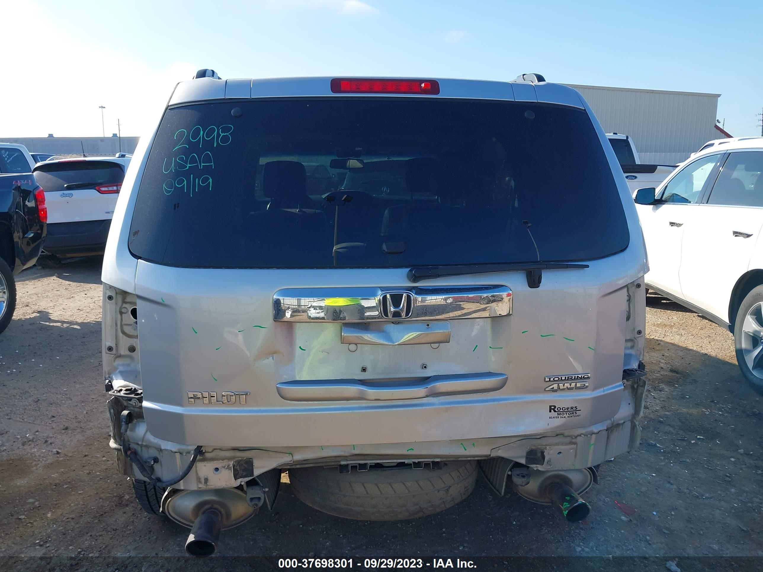 Photo 16 VIN: 5FNYF4H95CB022450 - HONDA PILOT 