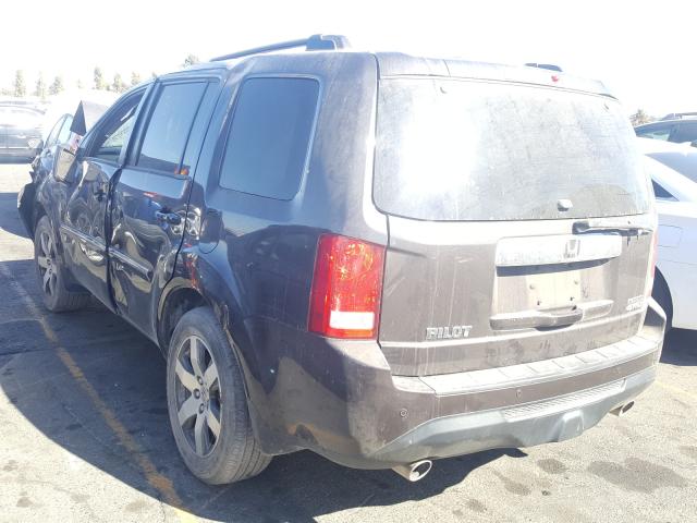 Photo 2 VIN: 5FNYF4H95CB070031 - HONDA PILOT TOUR 