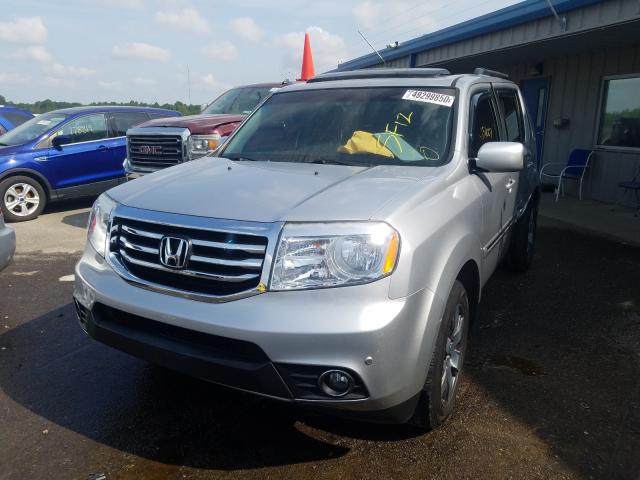 Photo 1 VIN: 5FNYF4H95CB083717 - HONDA PILOT TOUR 