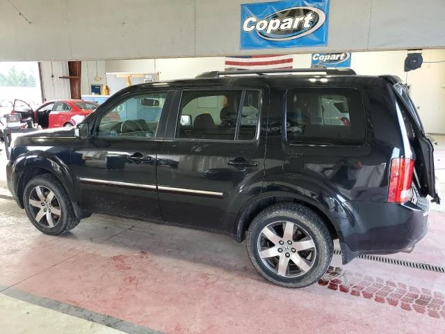 Photo 1 VIN: 5FNYF4H96CB052542 - HONDA PILOT TOUR 