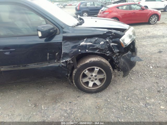 Photo 5 VIN: 5FNYF4H97BB101293 - HONDA PILOT 