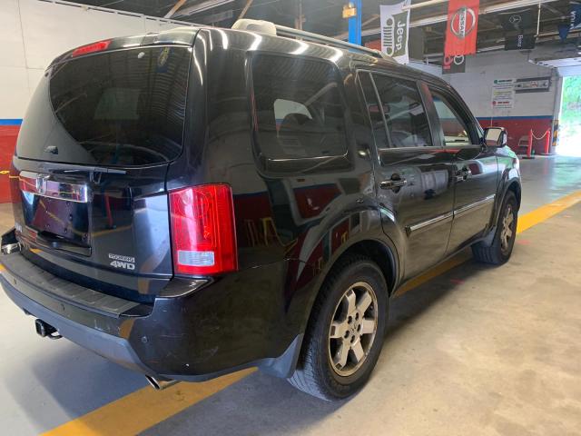 Photo 2 VIN: 5FNYF4H98AB020592 - HONDA PILOT TOUR 