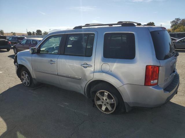 Photo 1 VIN: 5FNYF4H99AB029835 - HONDA PILOT TOUR 