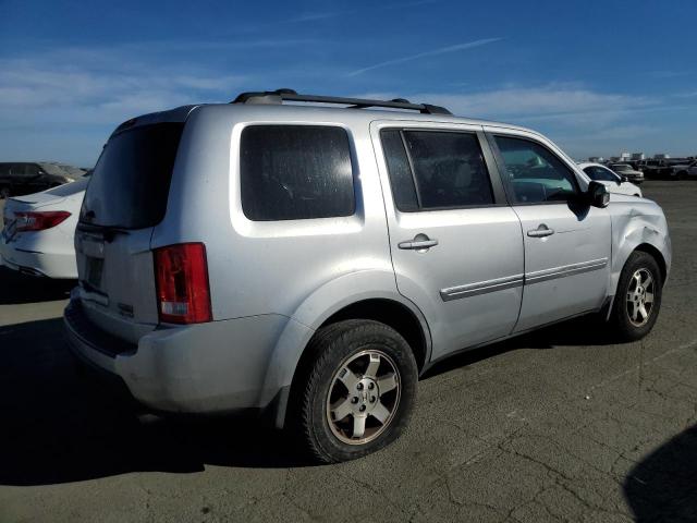 Photo 2 VIN: 5FNYF4H99AB029835 - HONDA PILOT TOUR 