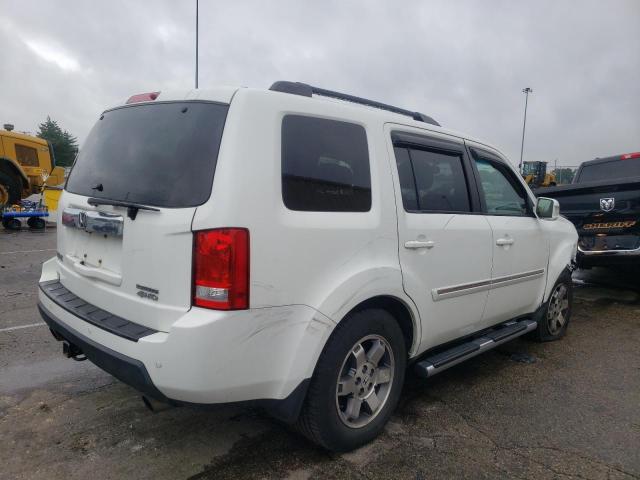 Photo 2 VIN: 5FNYF4H99AB041161 - HONDA PILOT TOUR 