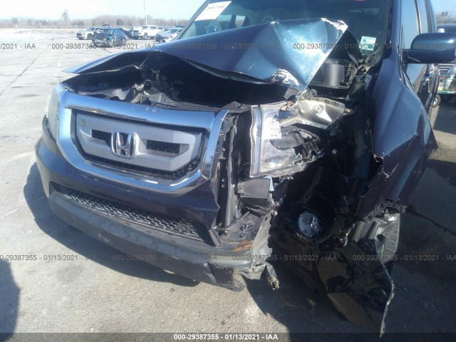 Photo 5 VIN: 5FNYF4H99BB094878 - HONDA PILOT 