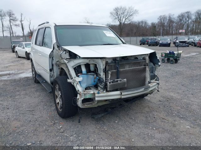 Photo 5 VIN: 5FNYF4H99BB101943 - HONDA PILOT 