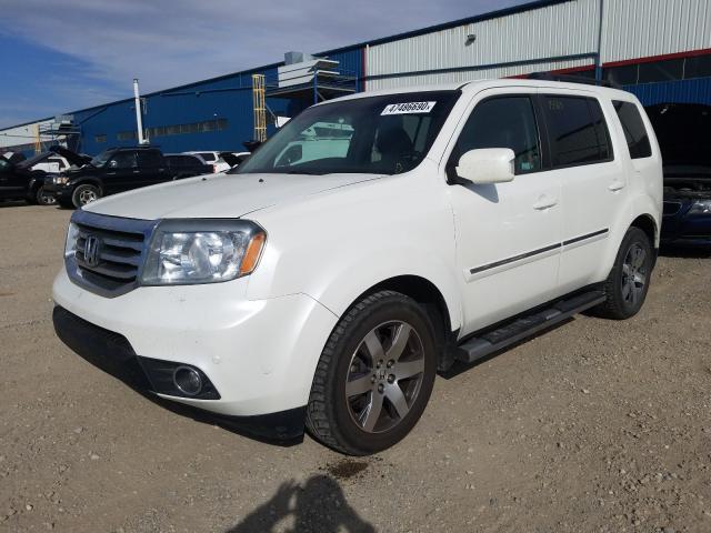 Photo 1 VIN: 5FNYF4H99CB505990 - HONDA PILOT TOUR 