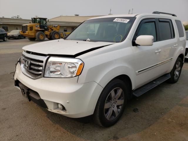 Photo 1 VIN: 5FNYF4H99DB067831 - HONDA PILOT TOUR 