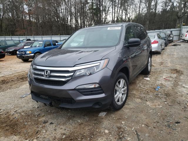 Photo 1 VIN: 5FNYF5H10GB030137 - HONDA PILOT LX 