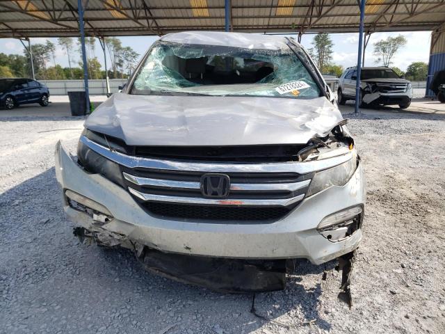 Photo 4 VIN: 5FNYF5H10HB047036 - HONDA PILOT LX 