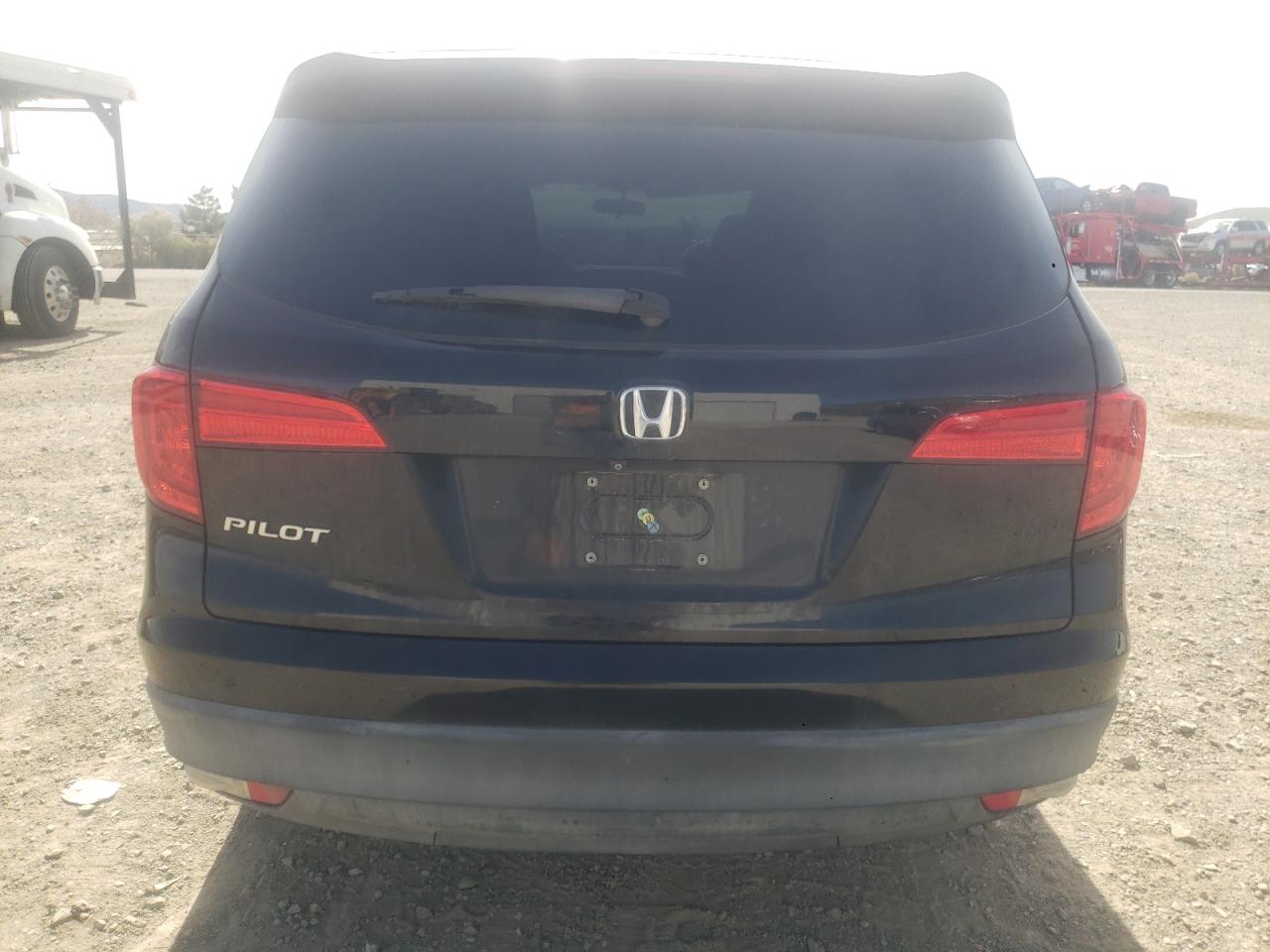 Photo 5 VIN: 5FNYF5H19GB055960 - HONDA PILOT 