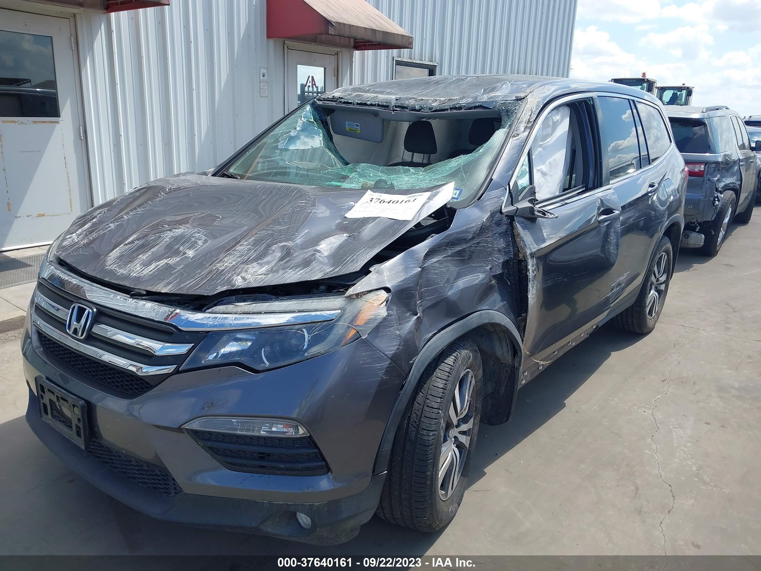 Photo 5 VIN: 5FNYF5H39GB019042 - HONDA PILOT 