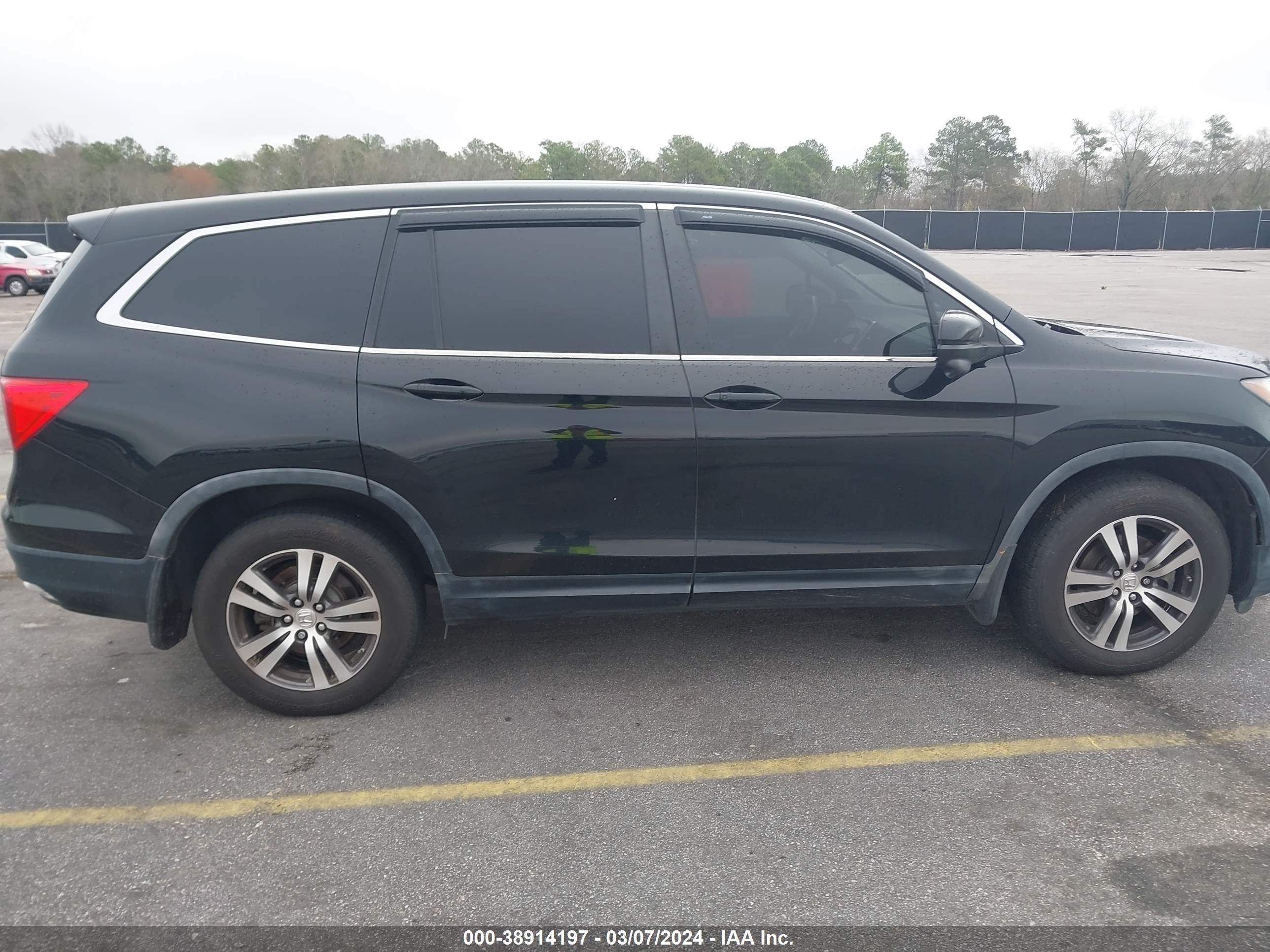 Photo 12 VIN: 5FNYF5H54GB045789 - HONDA PILOT 