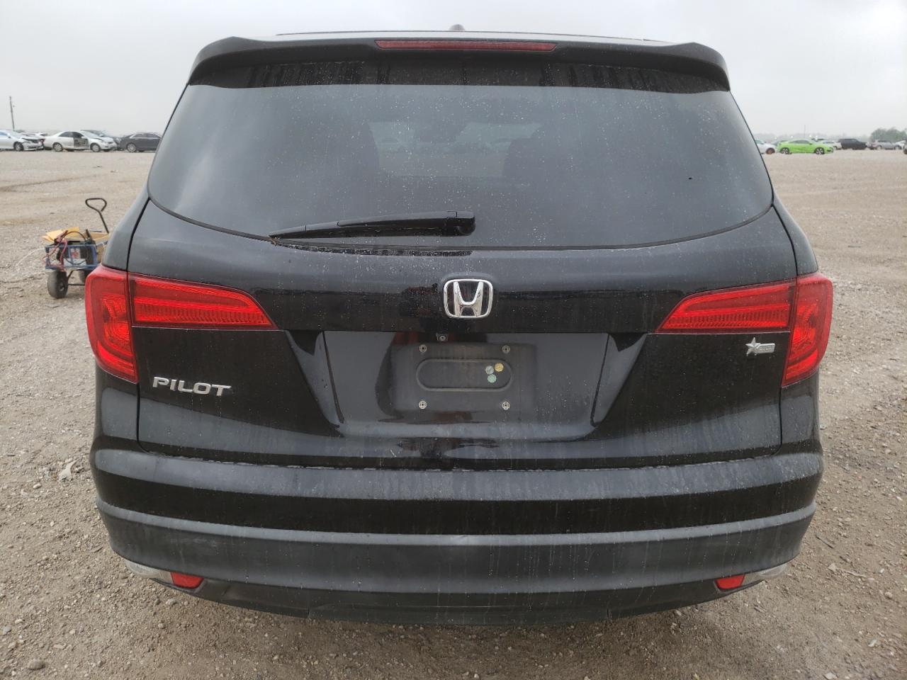 Photo 5 VIN: 5FNYF5H69GB055033 - HONDA PILOT 