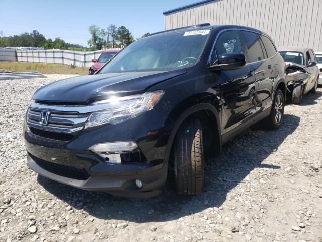 Photo 1 VIN: 5FNYF5H75GB057855 - HONDA PILOT EXLN 